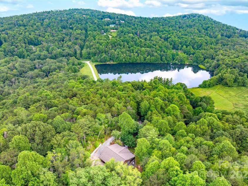 55 Lake Drive, Fairview, NC 28730.  MLS# CAR4272386, YatesRealty ID 33918. Just seconds to the 10 acre swimmable community lake