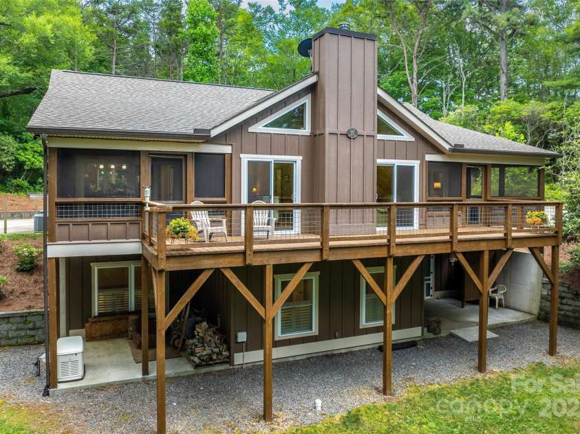 55 Lake Drive, Fairview, NC 28730.  MLS# CAR4272386, YatesRealty ID 33918. You'll spend your time on back deck!