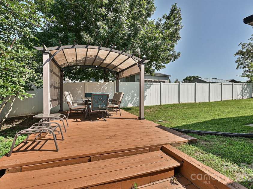 145 Magnolia Street, Mooresville, NC 28115.  MLS# CAR4292892, YatesRealty ID 33922. Deck with Pergola