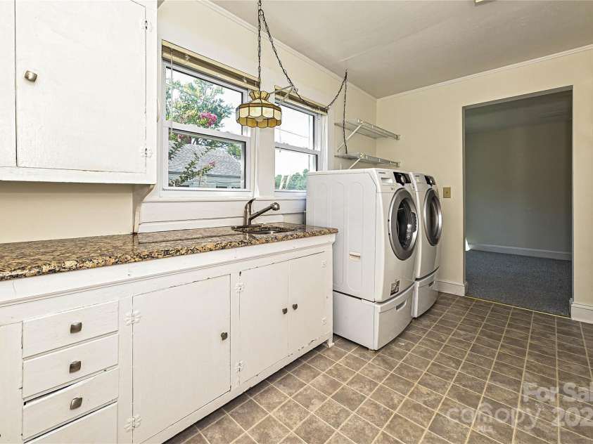 145 Magnolia Street, Mooresville, NC 28115.  MLS# CAR4292892, YatesRealty ID 33922. Laundry/ Primary Bedroom closet