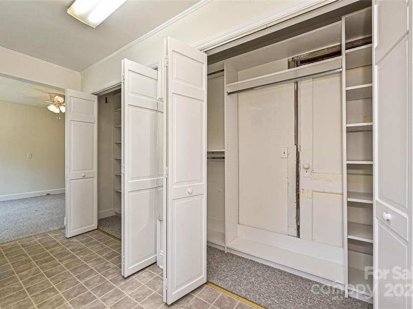 145 Magnolia Street, Mooresville, NC 28115.  MLS# CAR4292892, YatesRealty ID 33922. Laundry/ Primary Bedroom closet