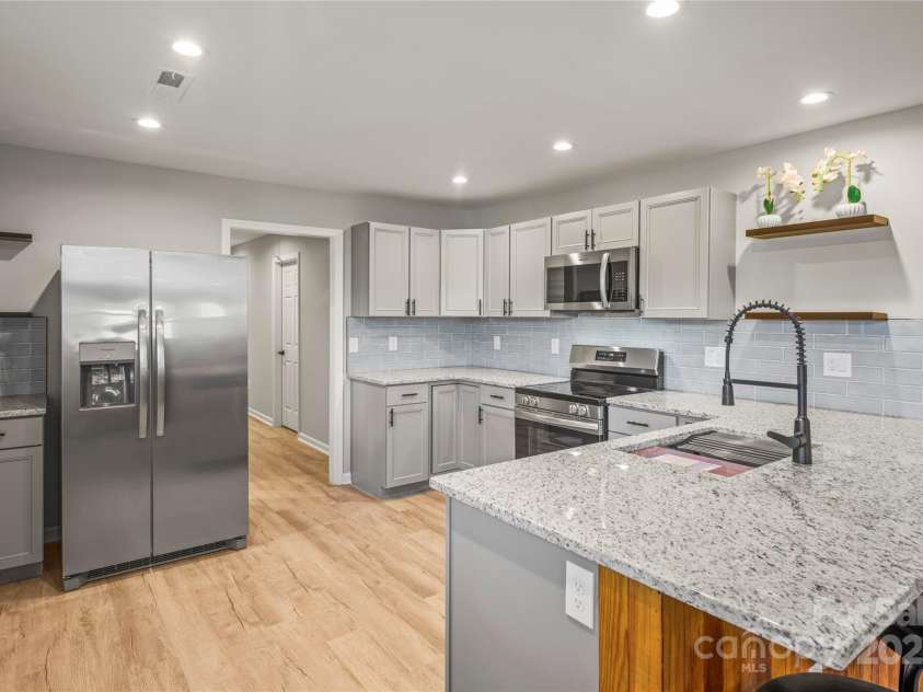 107 Poplar Street, Stanley, NC 28164.  MLS# CAR4246663, YatesRealty ID 33926. Floors are not brown, they are light grey