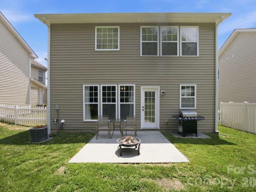 9511 Long Hill Drive, Charlotte, NC 28214.  MLS# CAR4393341, YatesRealty ID 33930. Back patio