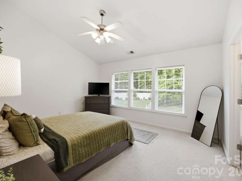 9511 Long Hill Drive, Charlotte, NC 28214.  MLS# CAR4393341, YatesRealty ID 33930. Primary bedroom overlooking the backyard