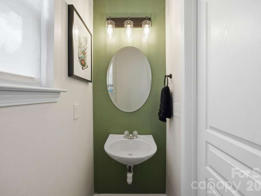 9511 Long Hill Drive, Charlotte, NC 28214.  MLS# CAR4393341, YatesRealty ID 33930. Updated half bath with tile floor