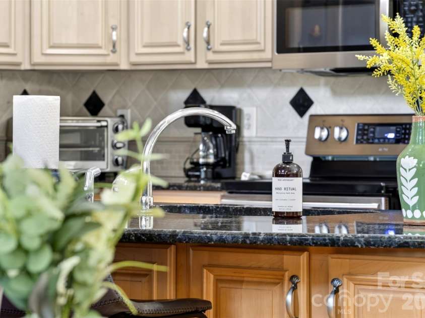 8234 Dennis Road, Charlotte, NC 28227.  MLS# CAR4390277, YatesRealty ID 33931. Kitchen area