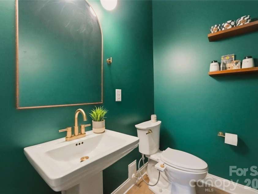 1222 Gaston Street, Charlotte, NC 28208.  MLS# CAR4394065, YatesRealty ID 33932. Main level half bath