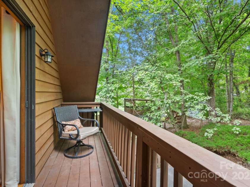 19 Mountain Brook Drive, Candler, NC 28715.  MLS# CAR4286834, YatesRealty ID 33932. Upper level walk out balcony