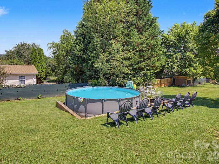 22 Sweet Briar Path Way, Hendersonville, NC 28792.  MLS# CAR4396421, YatesRealty ID 33933. Above ground pool