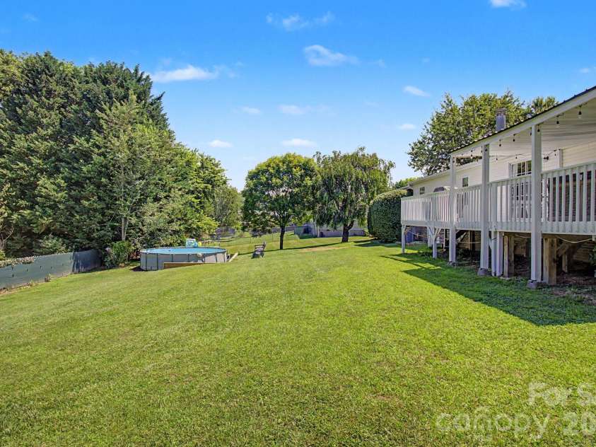 22 Sweet Briar Path Way, Hendersonville, NC 28792.  MLS# CAR4396421, YatesRealty ID 33933. Back yardBack yard