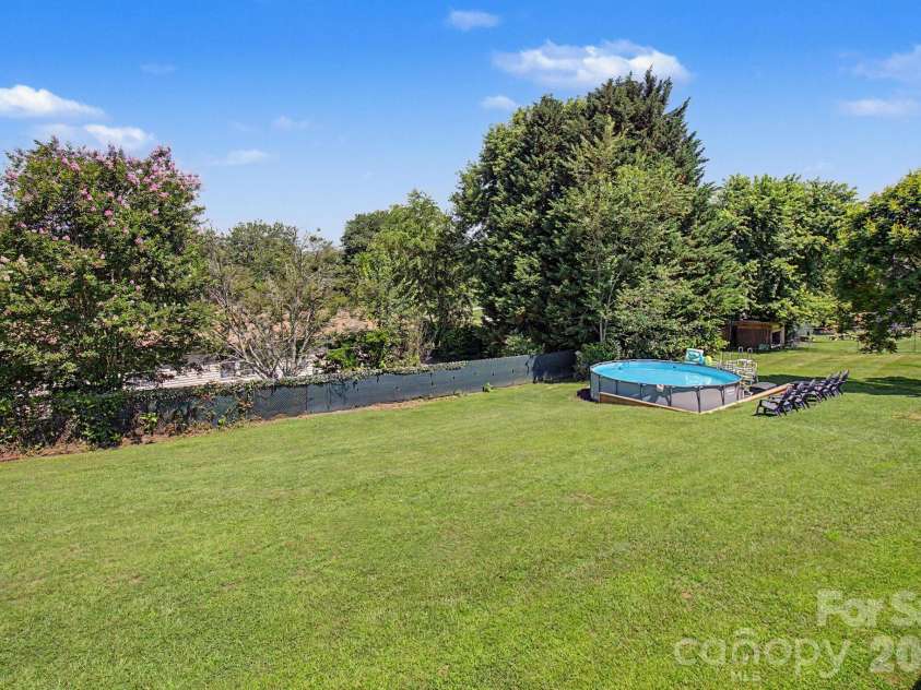 22 Sweet Briar Path Way, Hendersonville, NC 28792.  MLS# CAR4396421, YatesRealty ID 33933. Big yard with pool