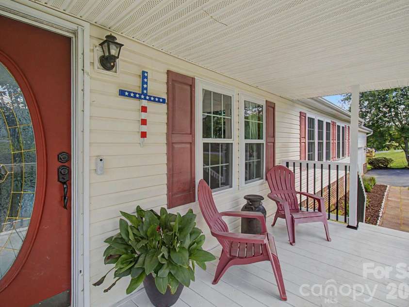 22 Sweet Briar Path Way, Hendersonville, NC 28792.  MLS# CAR4396421, YatesRealty ID 33933. Covered front porch