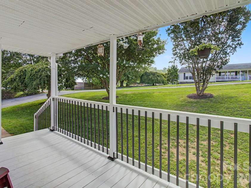22 Sweet Briar Path Way, Hendersonville, NC 28792.  MLS# CAR4396421, YatesRealty ID 33933. Covered front porch