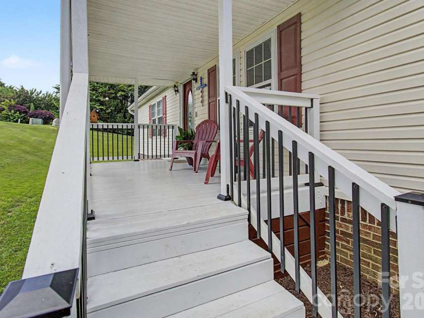 22 Sweet Briar Path Way, Hendersonville, NC 28792.  MLS# CAR4396421, YatesRealty ID 33933. Covered front porch