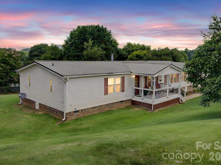 22 Sweet Briar Path Way, Hendersonville, NC 28792.  MLS# CAR4396421, YatesRealty ID 33933. Front at dusk