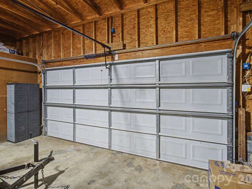 22 Sweet Briar Path Way, Hendersonville, NC 28792.  MLS# CAR4396421, YatesRealty ID 33933. Garage door