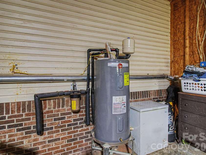 22 Sweet Briar Path Way, Hendersonville, NC 28792.  MLS# CAR4396421, YatesRealty ID 33933. Hot water in garage