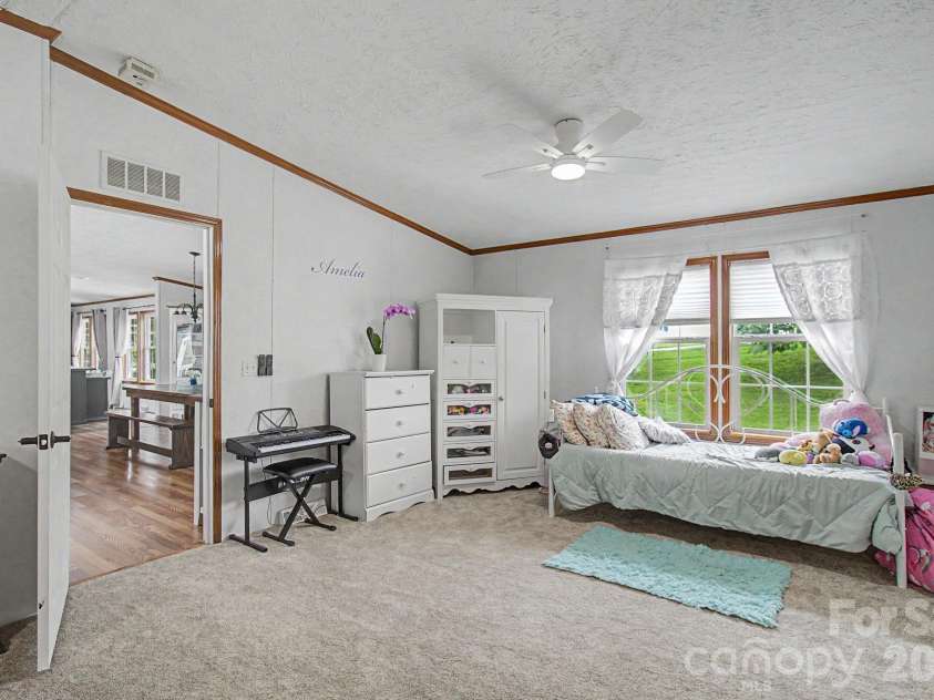 22 Sweet Briar Path Way, Hendersonville, NC 28792.  MLS# CAR4396421, YatesRealty ID 33933. Main bedroom
