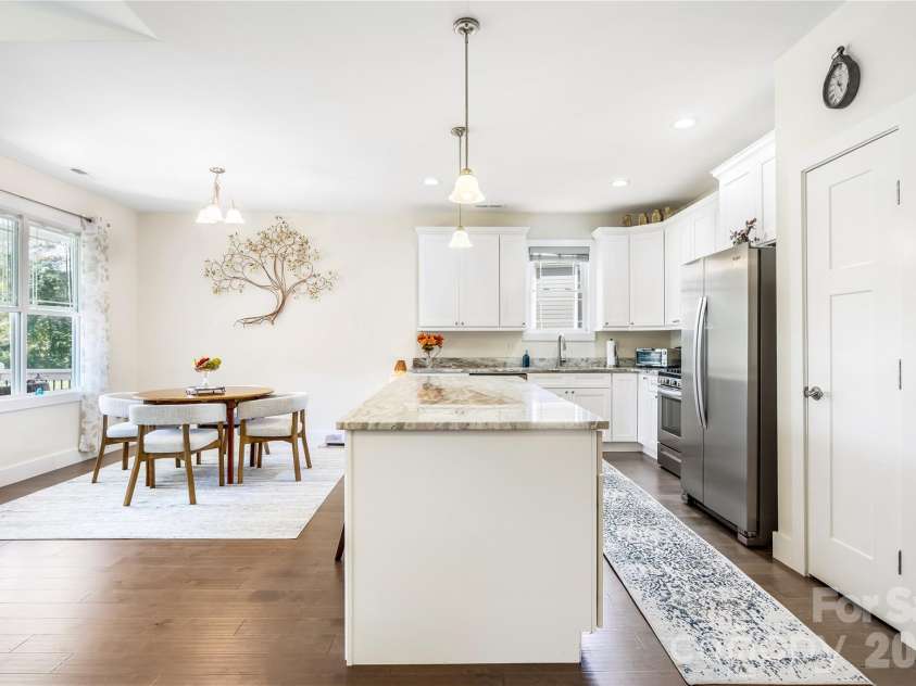376 Windy Acres Knoll Drive, Hendersonville, NC 28792.  MLS# CAR4381733, YatesRealty ID 33934. Kitchen and Dining area