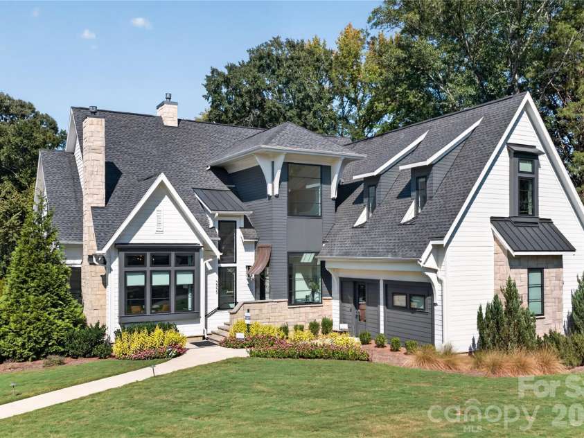 5555 Fairview Road, Charlotte, NC 28209.  MLS# CAR4398045, YatesRealty ID 33935. Copper Builders Model Home