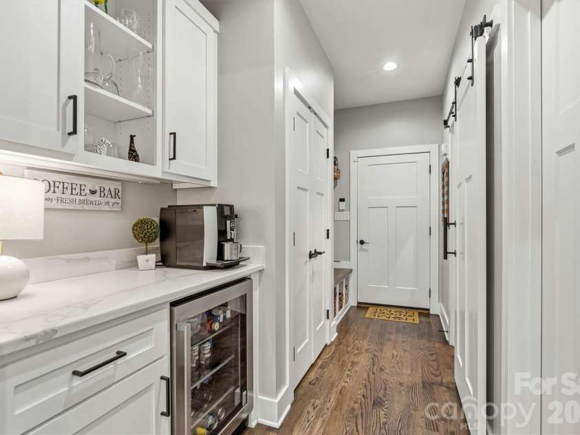 4975 Harbor View Drive, Granite Falls, NC 28630.  MLS# CAR4393944, YatesRealty ID 33937. Focused Coffee Bar/Drop Zone with Walk-In Pantry & Laundry Room Entry View 