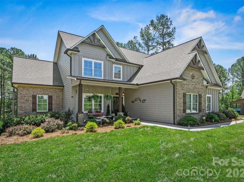 4975 Harbor View Drive, Granite Falls, NC 28630.  MLS# CAR4393944, YatesRealty ID 33937. Focused Front/Side View 