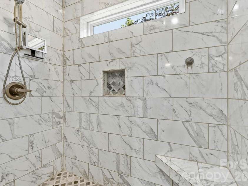 4975 Harbor View Drive, Granite Falls, NC 28630.  MLS# CAR4393944, YatesRealty ID 33937. Main Level Ensuite/Custom Shower View 
