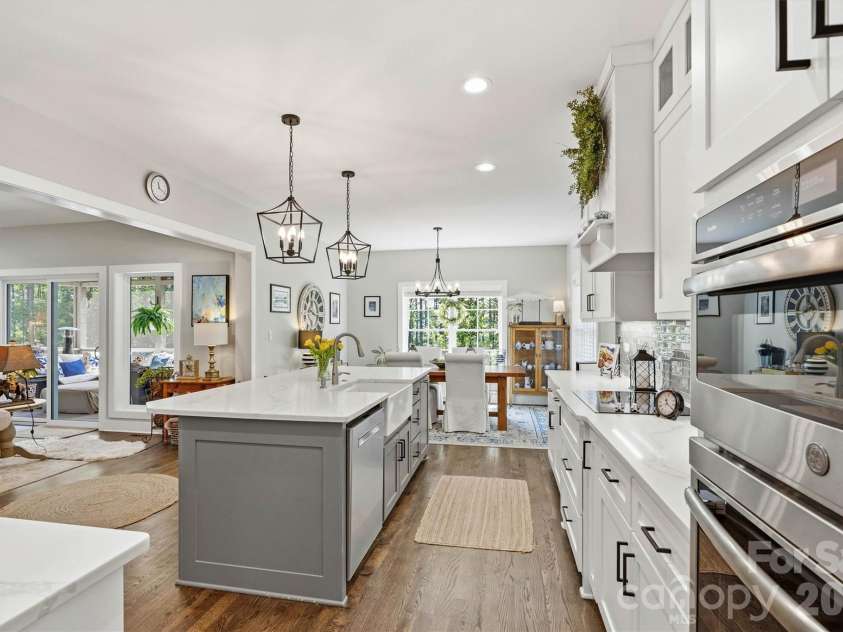 4975 Harbor View Drive, Granite Falls, NC 28630.  MLS# CAR4393944, YatesRealty ID 33937. Open Concept Kitchen/Dining/Screened Porch View 