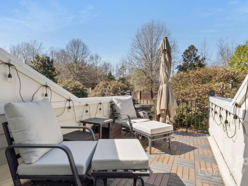 8534 Loxton Circle, Charlotte, NC 28214.  MLS# CAR4232602, YatesRealty ID 3394. Fabulous rooftop terrace with teak decking overlooks gorgeous landscaping
