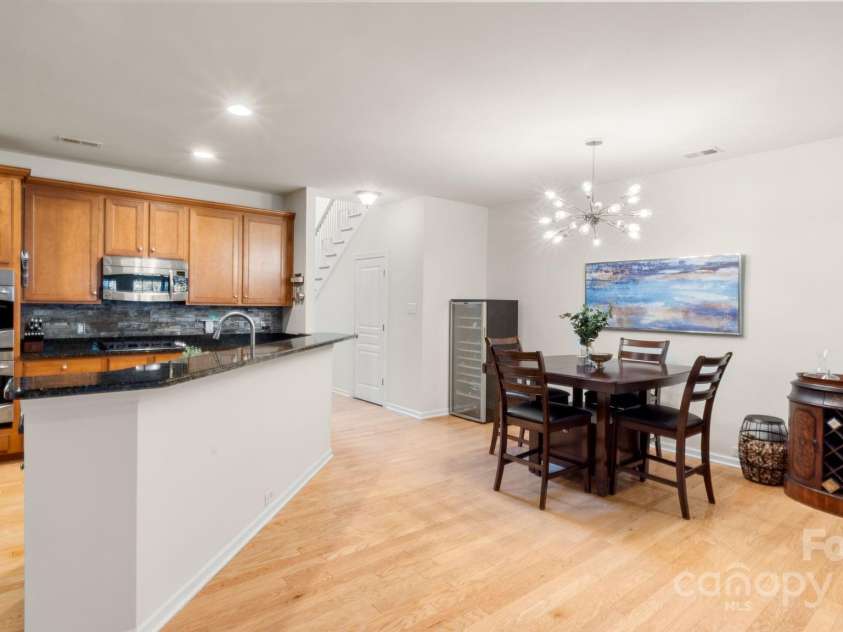 8534 Loxton Circle, Charlotte, NC 28214.  MLS# CAR4232602, YatesRealty ID 3394. Island bar seating AND dining space!