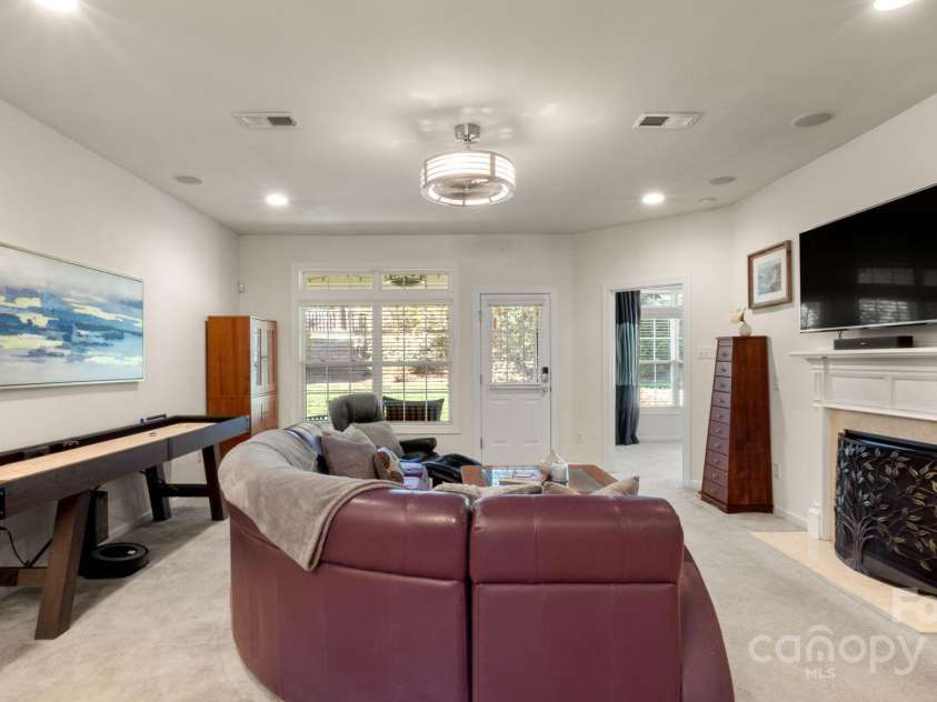 8534 Loxton Circle, Charlotte, NC 28214.  MLS# CAR4232602, YatesRealty ID 3394. Living room has built-in speaker system perfect for movie nights!