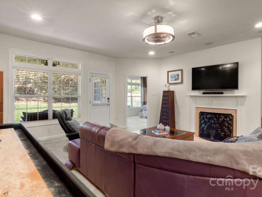 8534 Loxton Circle, Charlotte, NC 28214.  MLS# CAR4232602, YatesRealty ID 3394. Lovely built ins next to cozy gas fireplace