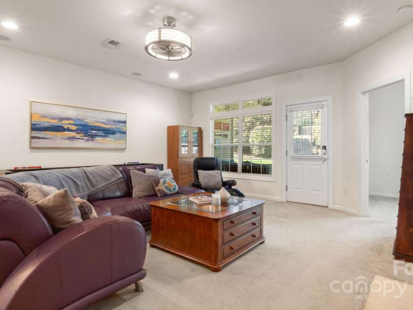 8534 Loxton Circle, Charlotte, NC 28214.  MLS# CAR4232602, YatesRealty ID 3394. Spacious living room with cozy gas fireplace with open floor plan
