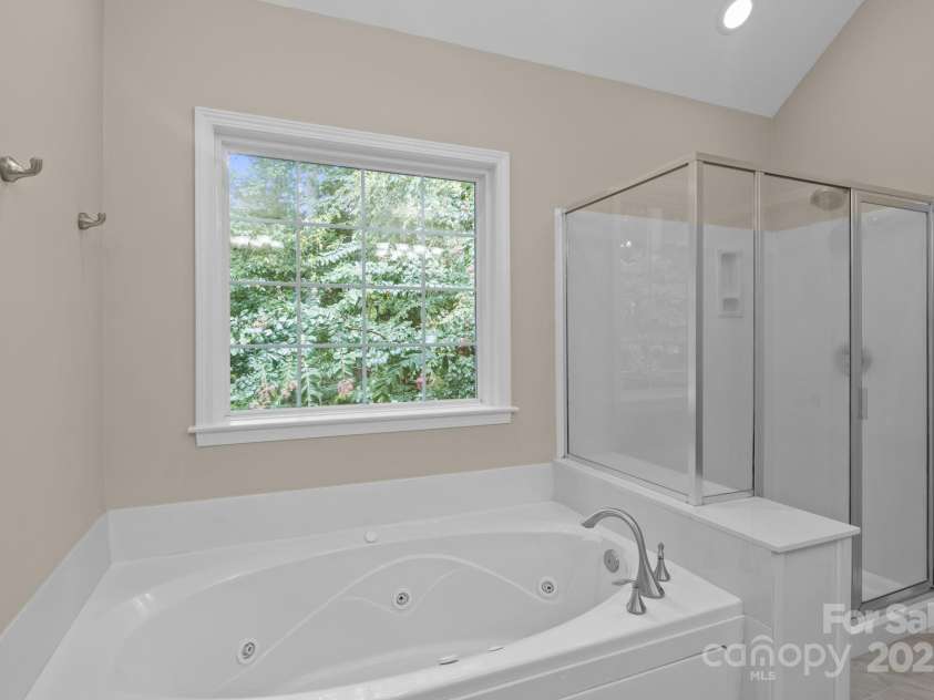 16923 Laureate Road, Huntersville, NC 28078.  MLS# CAR4286306, YatesRealty ID 33940. Primary bathroom