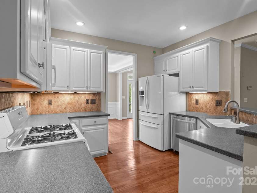 16923 Laureate Road, Huntersville, NC 28078.  MLS# CAR4286306, YatesRealty ID 33940. Wood flooring throughout first floor