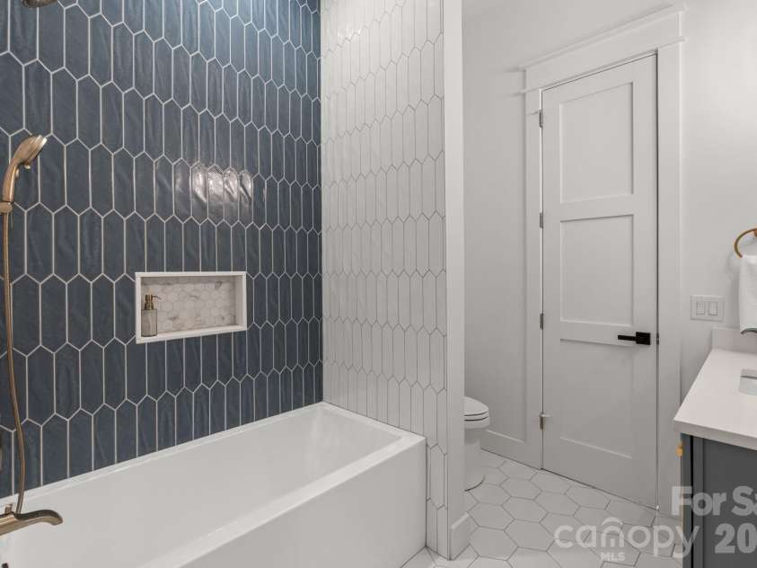 7 Temujin Drive, Leicester, NC 28748.  MLS# CAR4397809, YatesRealty ID 33945. 4th Bathroom ( Basement)