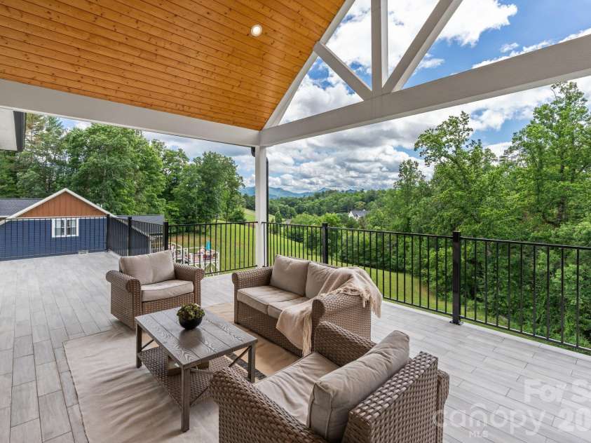 7 Temujin Drive, Leicester, NC 28748.  MLS# CAR4397809, YatesRealty ID 33945. Main Vaulted Deck