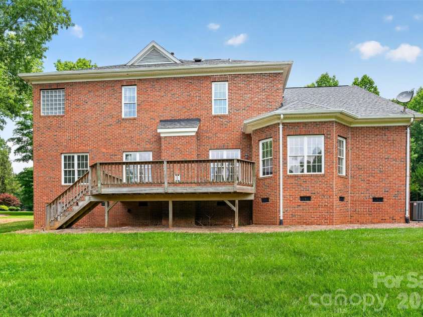 1900 Crestgate Drive, Waxhaw, NC 28173.  MLS# CAR4385753, YatesRealty ID 33946. Back of home