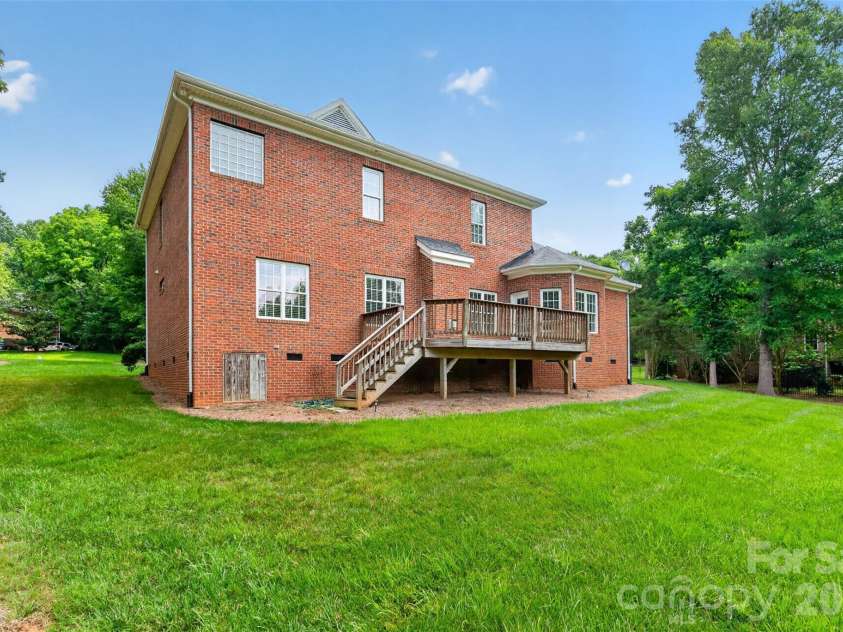 1900 Crestgate Drive, Waxhaw, NC 28173.  MLS# CAR4385753, YatesRealty ID 33946. Rear of home