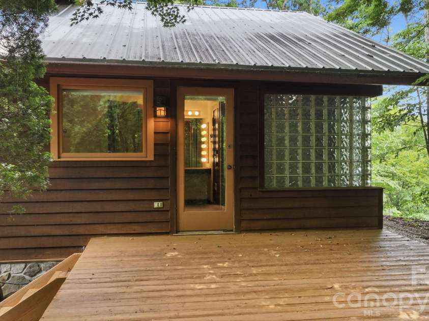 11150 Highway 19W Highway, Bryson City, NC 28713.  MLS# CAR4394806, YatesRealty ID 33948. This deck is directly off the Guest Bathroom