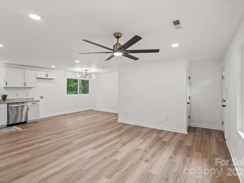 3030 Mac Drive, Hudson, NC 28638.  MLS# CAR4289028, YatesRealty ID 33950. LIVING ROOM/DINNING