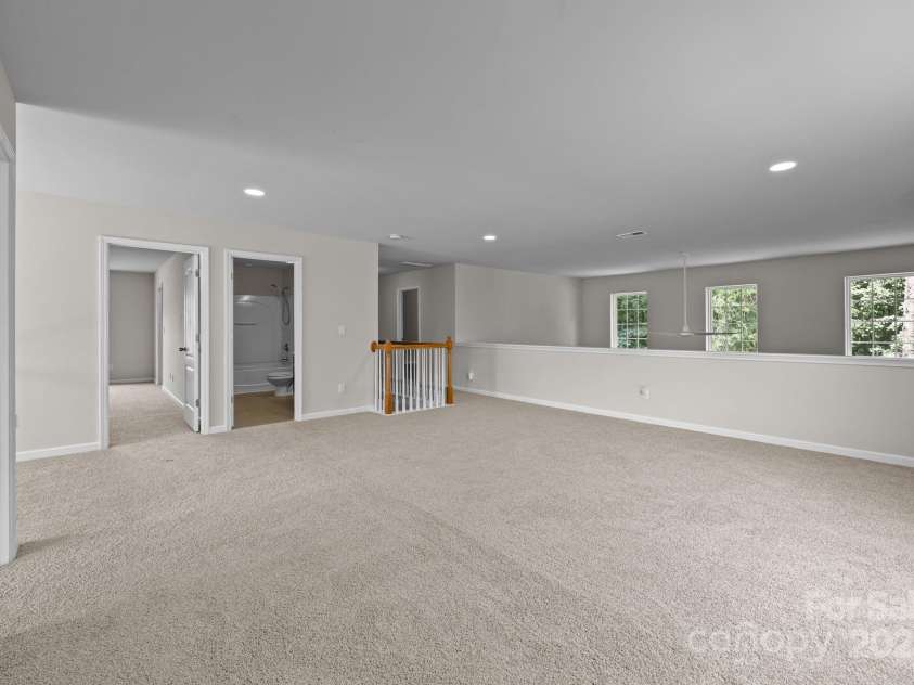 555 Settlers Grove Lane, Salisbury, NC 28146.  MLS# CAR4292670, YatesRealty ID 33958. Flex space with over look into the 2 story Great room