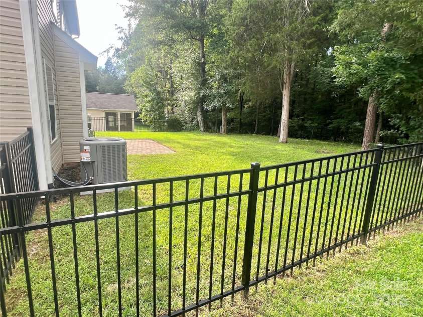 555 Settlers Grove Lane, Salisbury, NC 28146.  MLS# CAR4292670, YatesRealty ID 33958. Nice fenced in rear yard