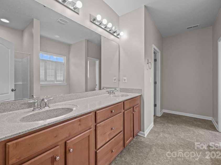 555 Settlers Grove Lane, Salisbury, NC 28146.  MLS# CAR4292670, YatesRealty ID 33958. Primary bath- Dual sinks