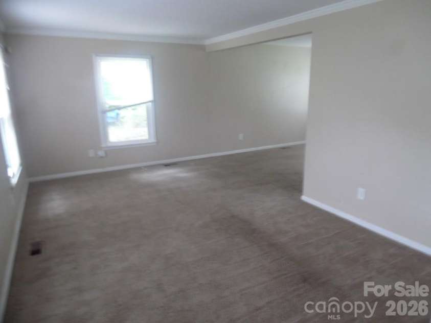 6311 Coach Hill Lane, Charlotte, NC 28212.  MLS# CAR4398478, YatesRealty ID 33964. 