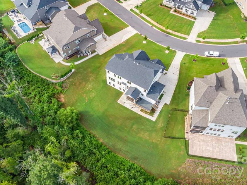 6059 Ancestry Trail, Indian Land, SC 29707.  MLS# CAR4289707, YatesRealty ID 33970. Backyard privacy buffer – no rear neighbors