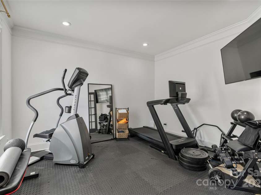 11009 Royal Colony Drive, Waxhaw, NC 28173.  MLS# CAR4295056, YatesRealty ID 33972. Office used as gym on main level