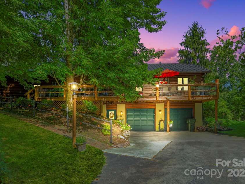 85 Rock Rest Road, Hendersonville, NC 28739.  MLS# CAR4282137, YatesRealty ID 33979. At the end of the day - home beckons you.