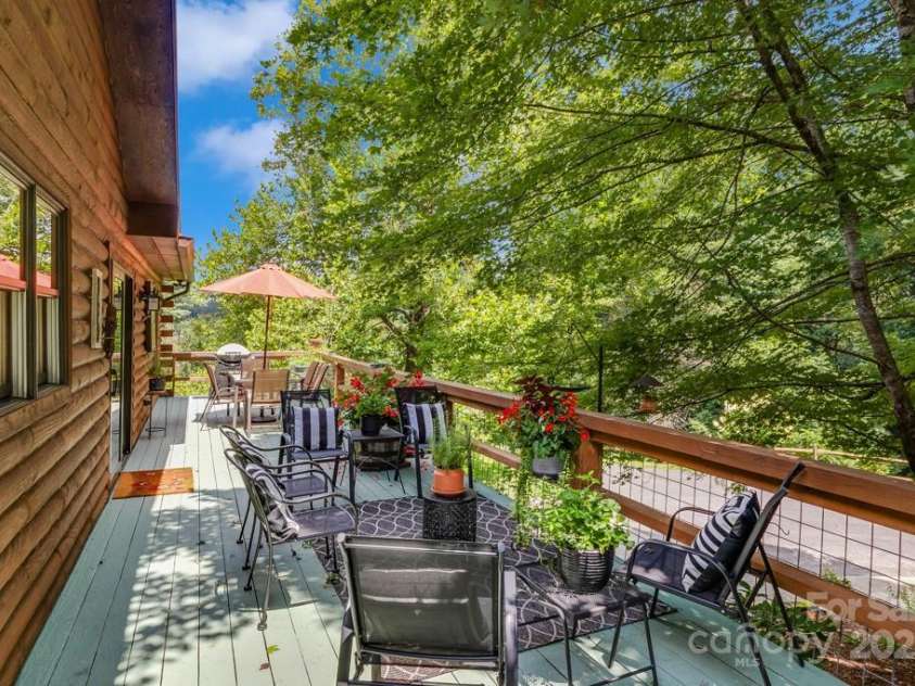 85 Rock Rest Road, Hendersonville, NC 28739.  MLS# CAR4282137, YatesRealty ID 33979. Easy access outdoor living spaces with sun and shade!