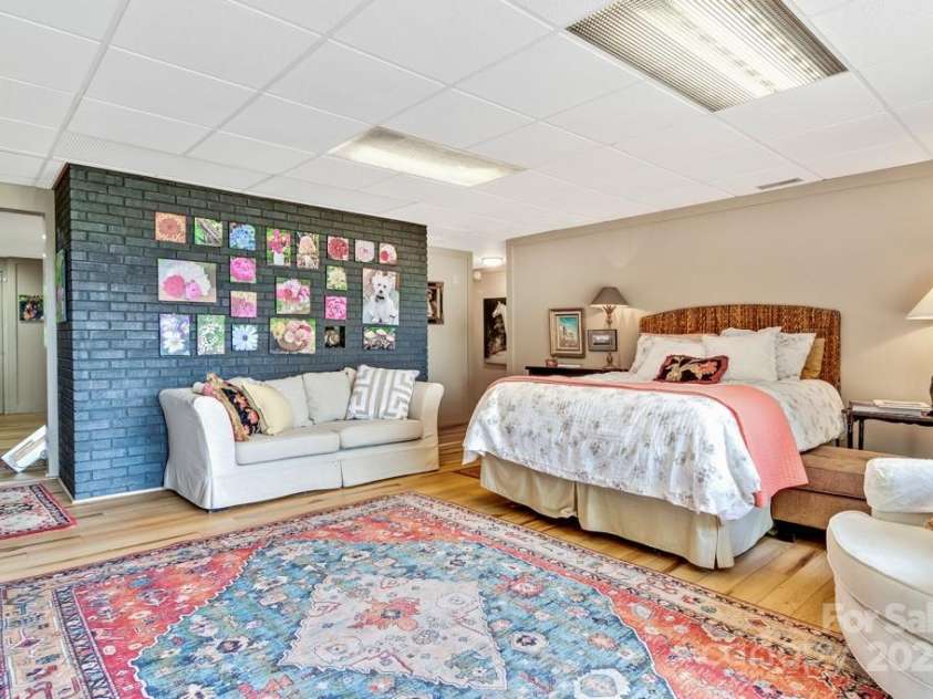 85 Rock Rest Road, Hendersonville, NC 28739.  MLS# CAR4282137, YatesRealty ID 33979. Full downstairs LVP makes for easy maintenance!
